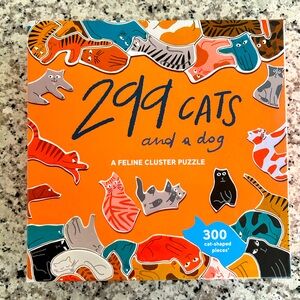 299 cats and a dog puzzle. 300 cat shaped pieces.